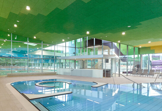 [Translate to CN:] Indoor Swimming Pool with Heradesign Solutions from Knauf Ceiling Solutions Installed