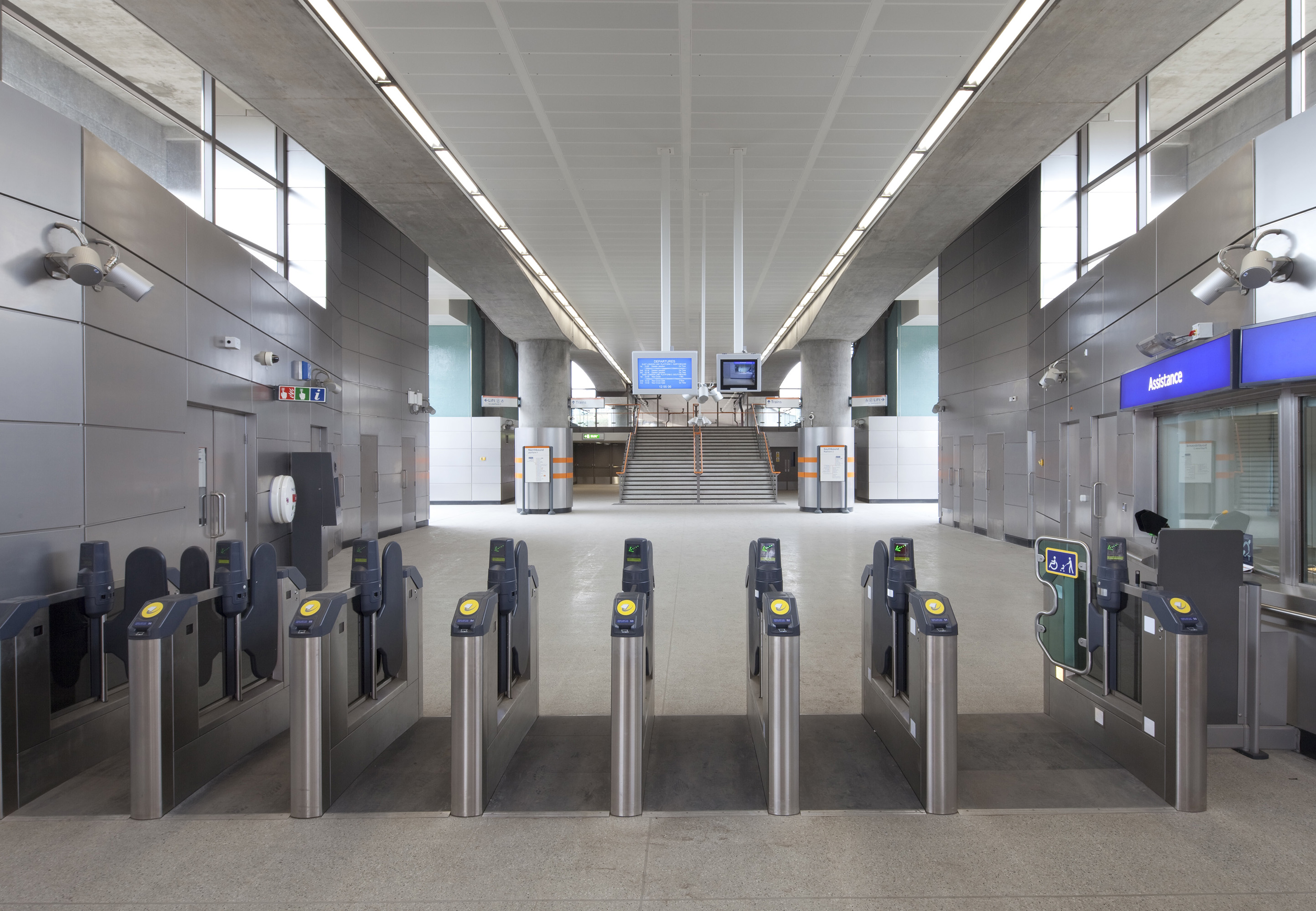 Underground Train Station Ticket Hall Using Armstrong METAL Solutions with TrioGuard™ Coating from Knauf Ceiling Solutions